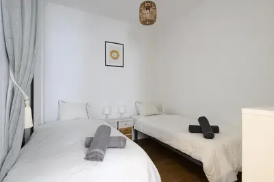 Cama o camas de una habitación en HJS Plaza Suites Apartments II