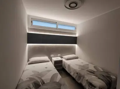 Cama o camas de una habitación en Holiday Apartment Alegranza