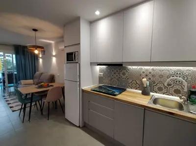 Una cocina o zona de cocina en Holiday Apartment Alegranza