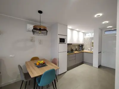 Una cocina o zona de cocina en Holiday Apartment Alegranza