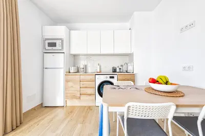 Una cocina o zona de cocina en Apartamento céntrico en playa del inglés