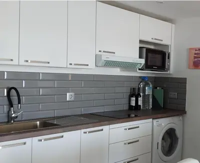 Una cocina o zona de cocina en Playa del ingles Tamaran apartamento 509