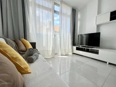 Una televisión o centro de entretenimiento en Graciano's Sea house