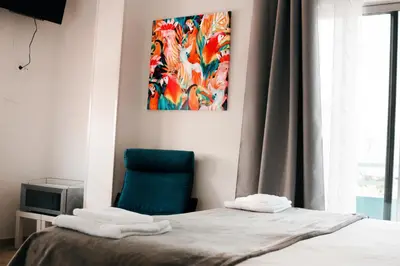 Cama o camas de una habitación en Resort Suites Vecindario